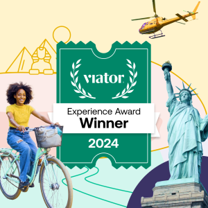 Viator Experience Award 2024 graphic with a cyclist, helicopter, and Statue of Liberty.